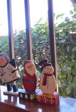 santa and snowman by the window at entrance